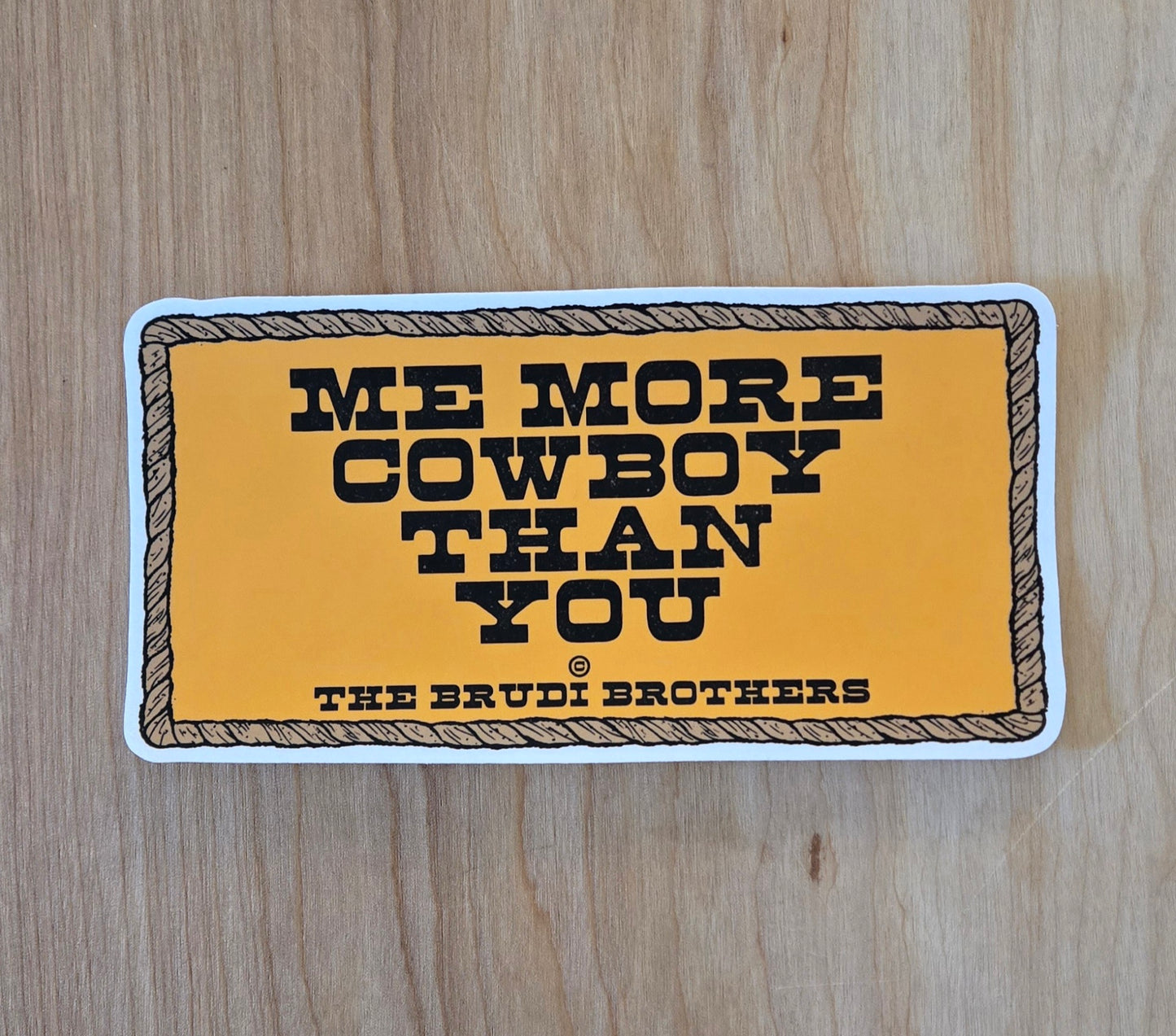 "Me More Cowboy"  rope boarder sticker